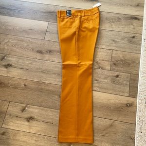 NWT! Brand new, never worn mustard yellow pants. Size 12.